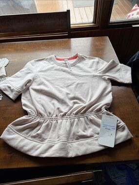Lululemon Light Blush Elastic Waist Peplum Top size 8 NWTS